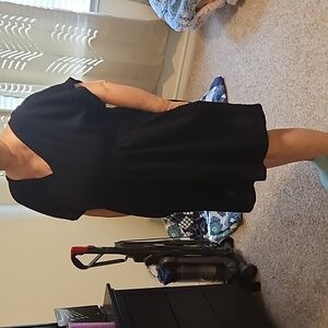 Knee Length Black dress with Pockets.